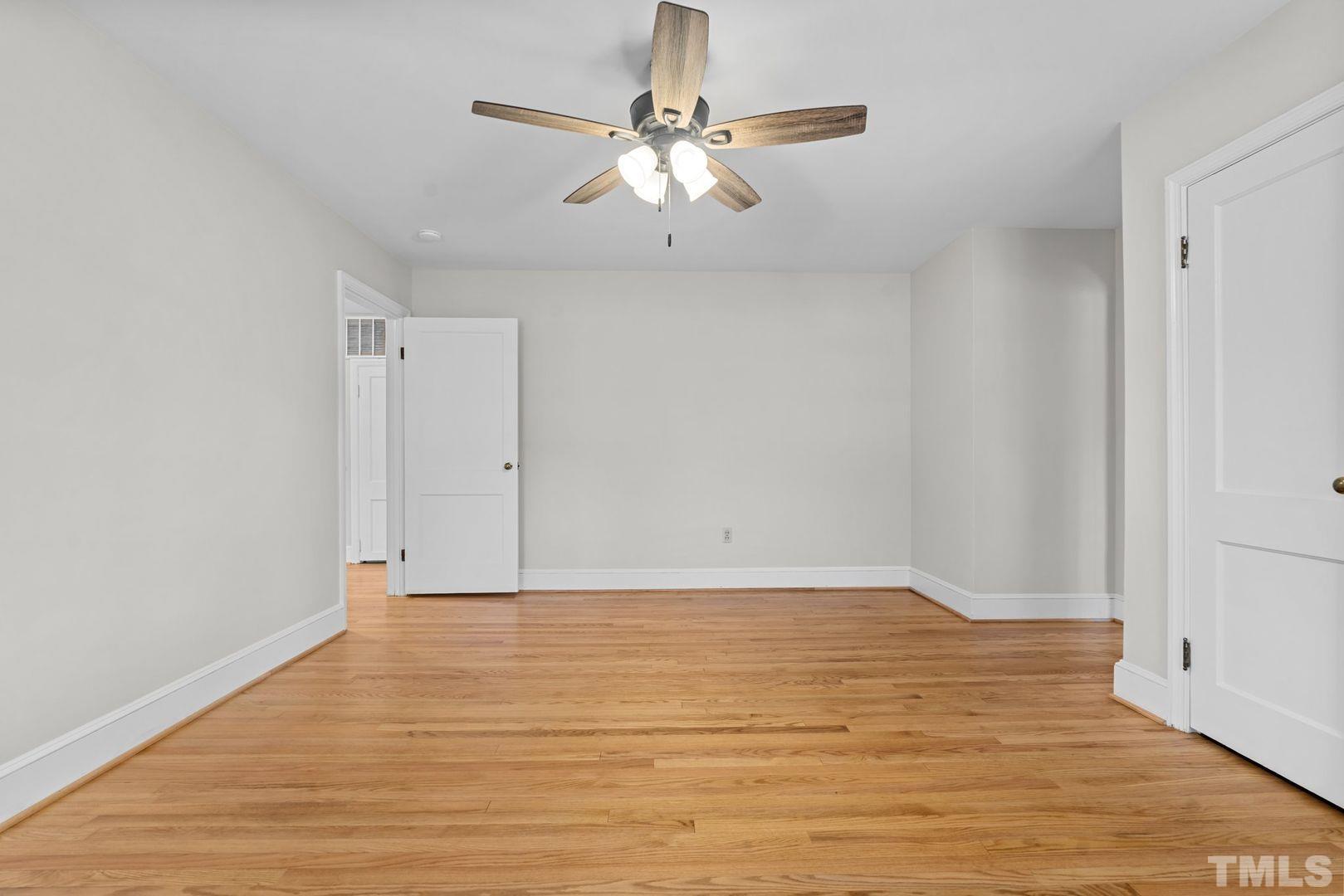 6198 Highway 401 Bunnlevel, NC 28323 - Photo 25 of 33 a view of an empty room with wooden floor