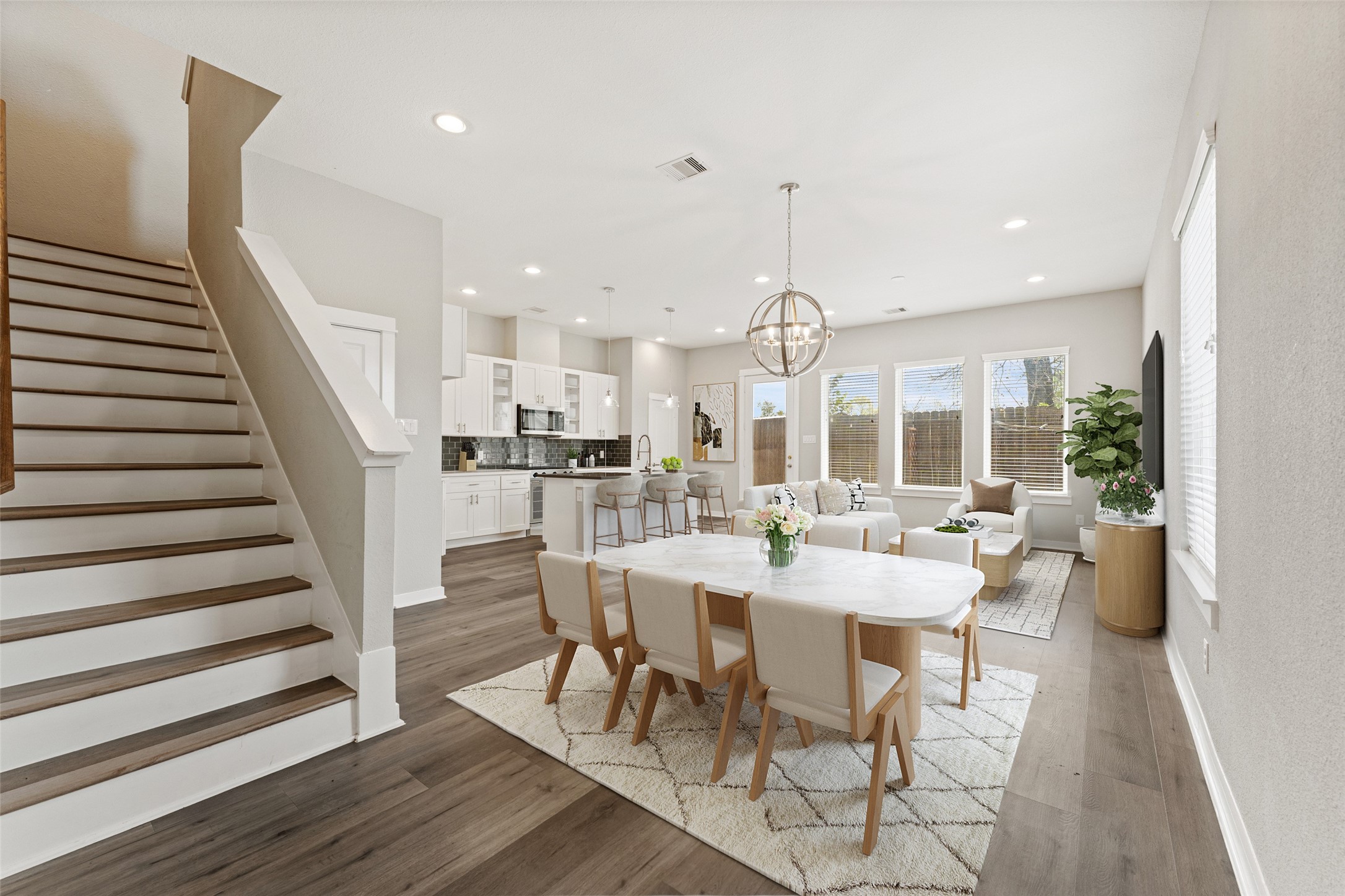 802 Berry Sage Lane Houston, TX 77022 - Photo 5 of 26 Open dining, living and kitchen. Virtually Staged.