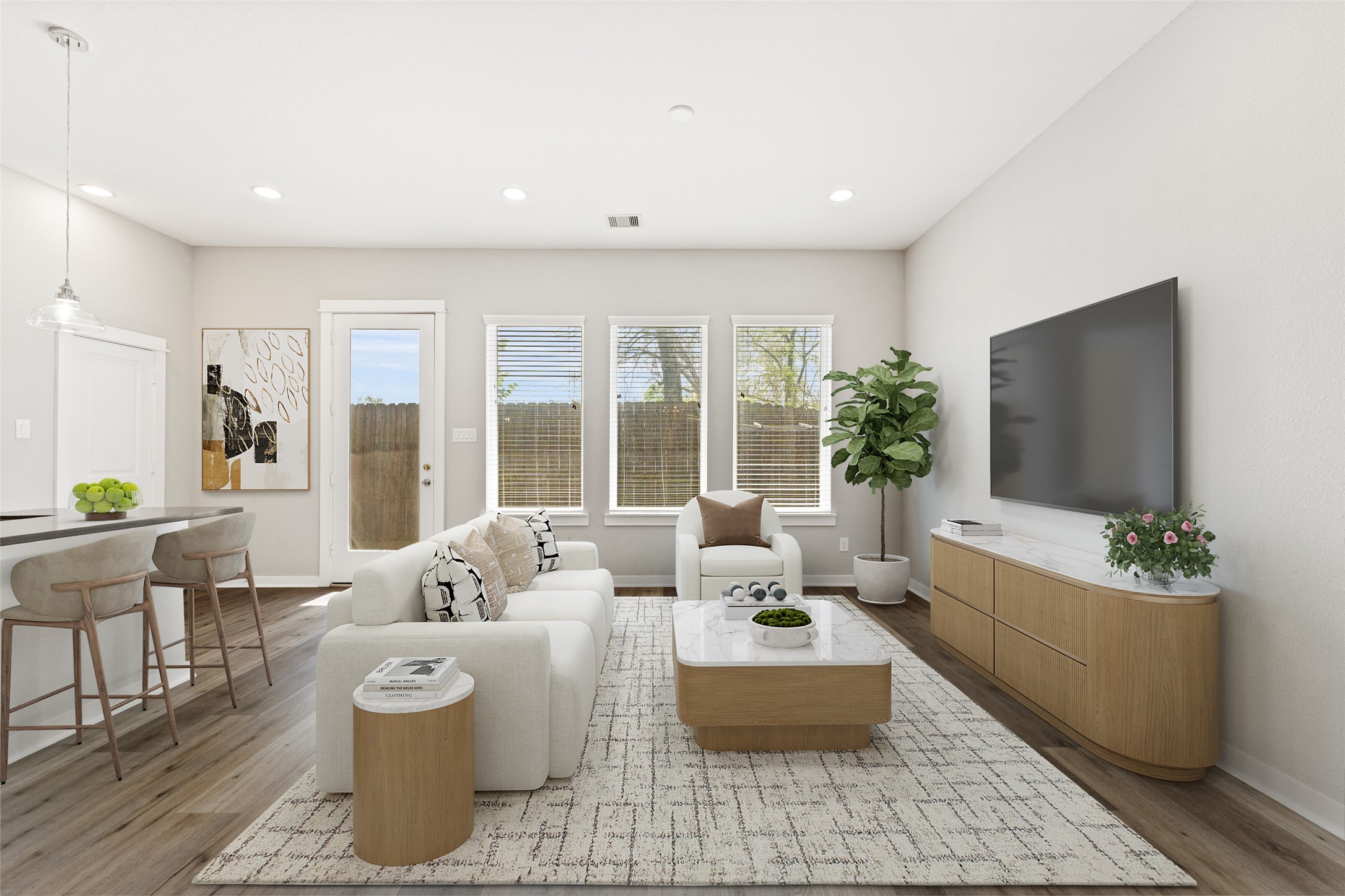802 Berry Sage Lane Houston, TX 77022 - Photo 6 of 26 Living room with views to the backyard. Virtually staged