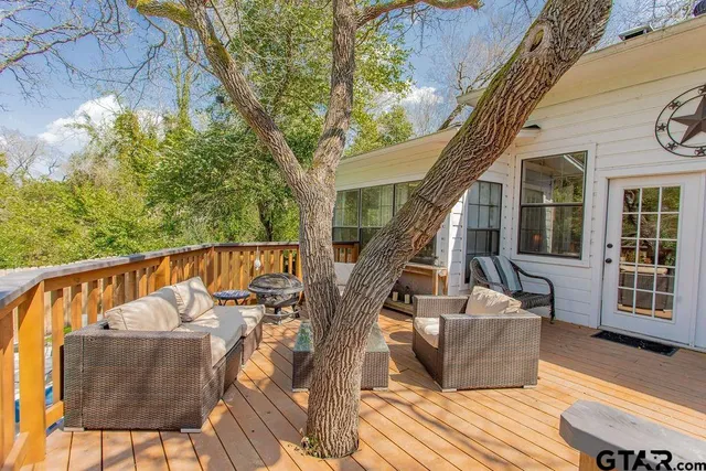a view of a balcony with chairs