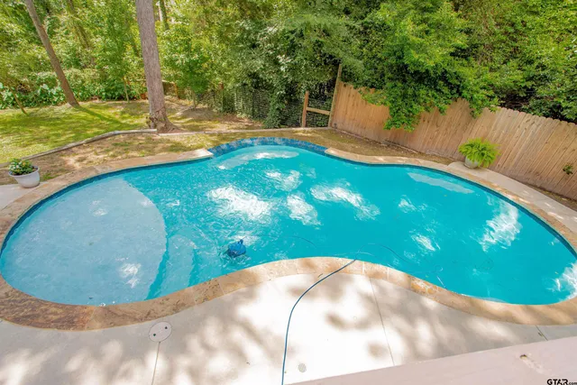 a view of a yard with an outdoor space