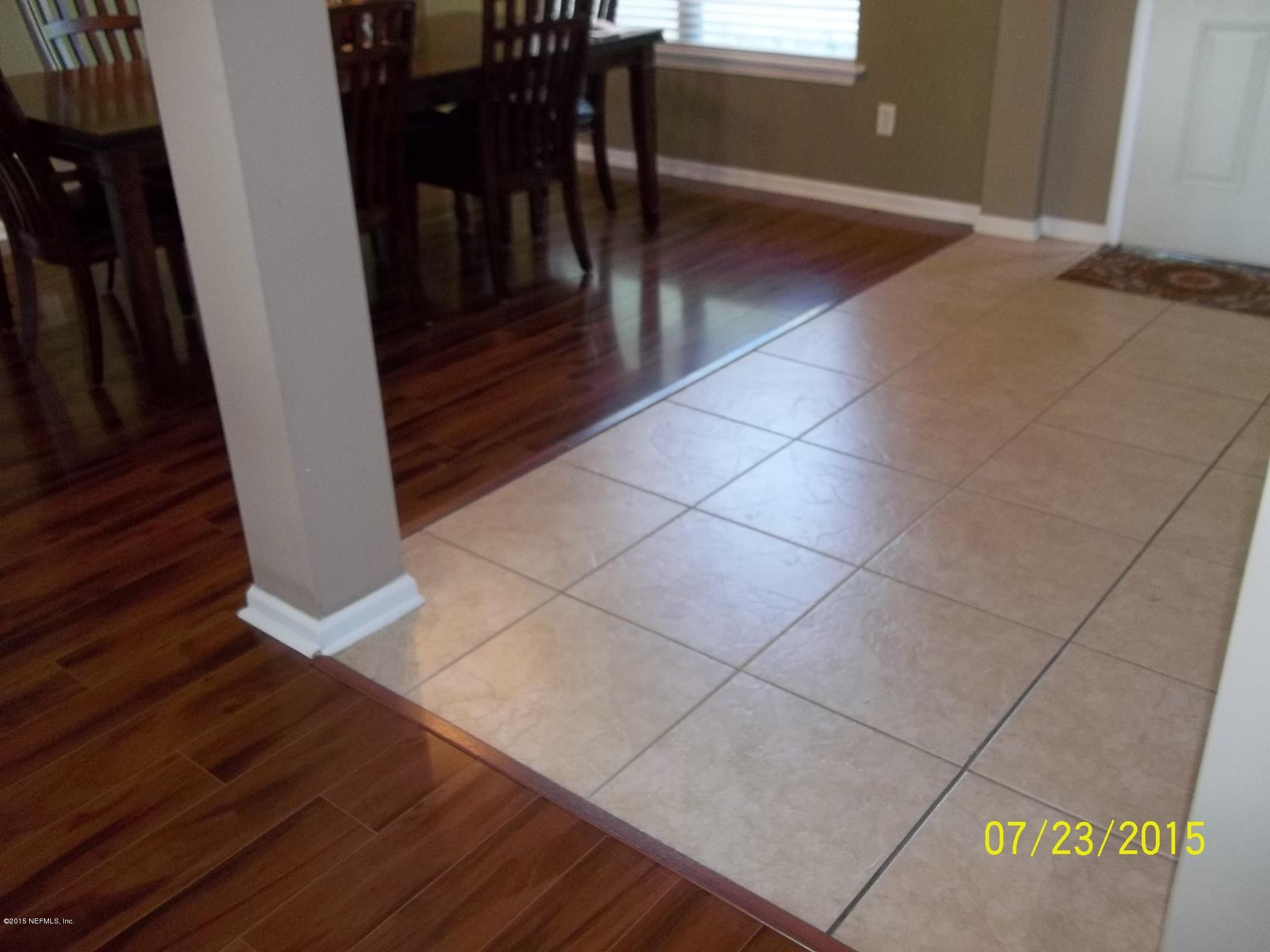 3103 Longleaf Ranch Circle Middleburg, FL 32068 - Photo 8 of 49 Foyer & Dining Room