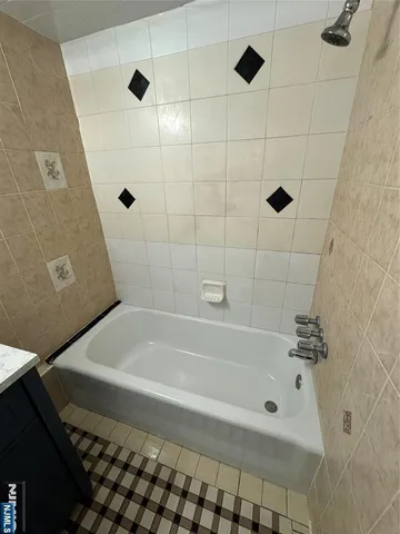a bathroom with a bathtub