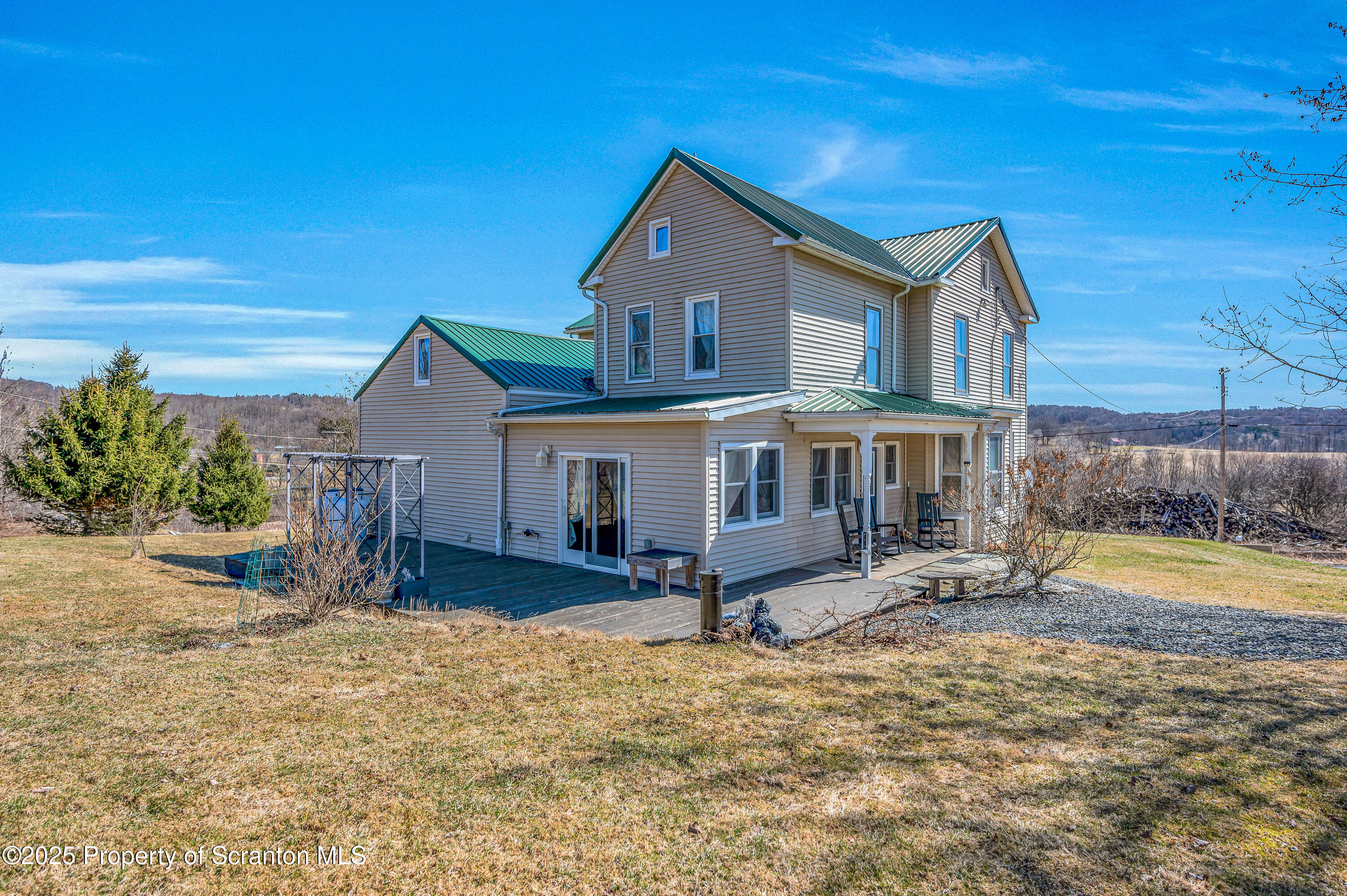 5115 State Rte 3013 Springville, PA 18844 - Photo 6 of 74 a front view of a house with garden