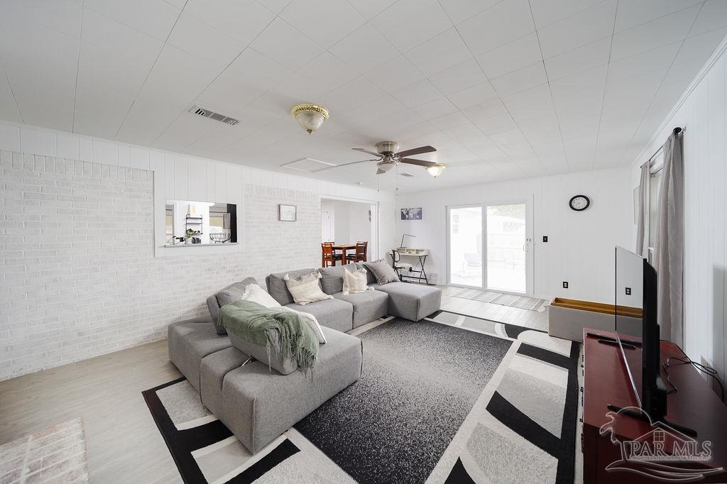 6841 Data Street Pensacola, FL 32504 - Photo 12 of 25 a living room with furniture