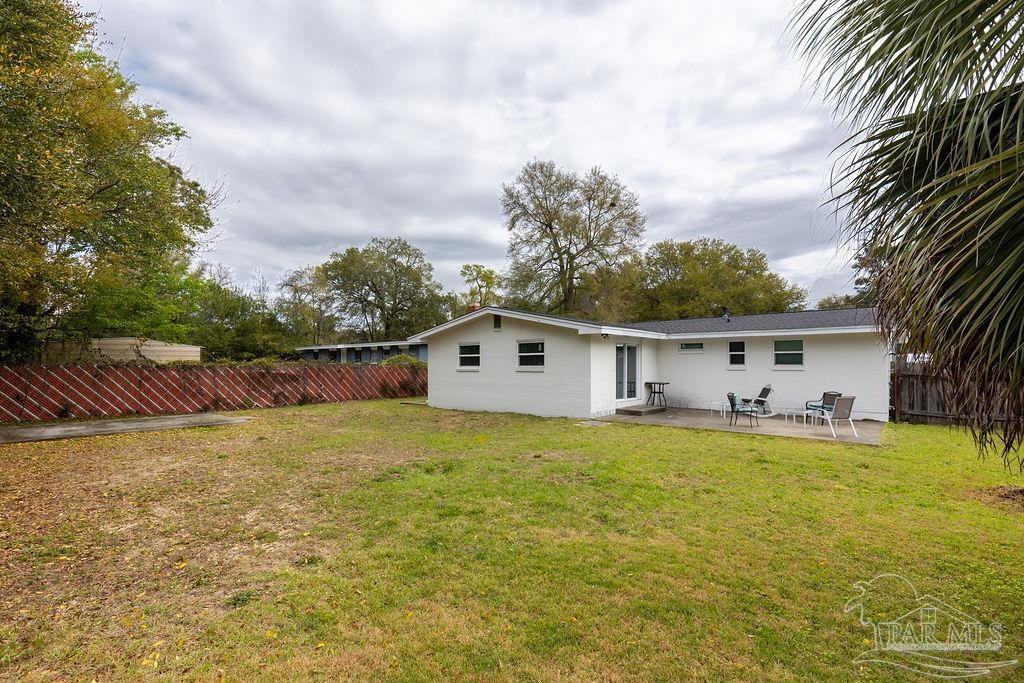 6841 Data Street Pensacola, FL 32504 - Photo 22 of 25 a house view with a garden space