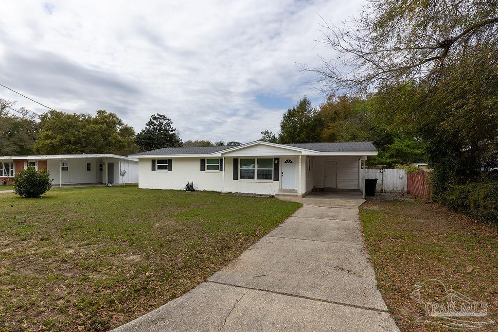 6841 Data Street Pensacola, FL 32504 - Photo 4 of 25 a front view of house with yard and trees