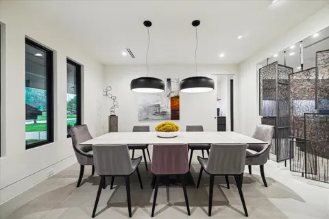 a lobby with furniture and a potted plant