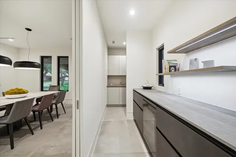 a room with furniture and a flat screen tv