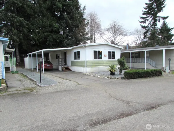 a house with trees in the background