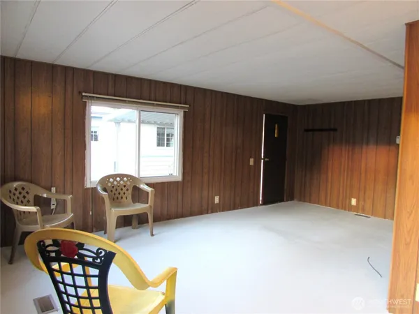 a view of livingroom with furniture and windows