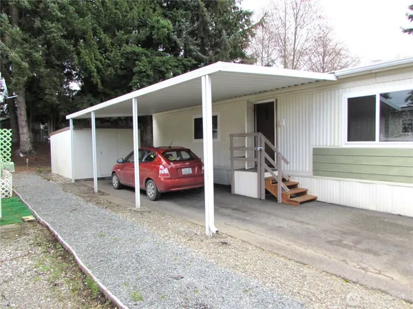 a view of a car in front of house