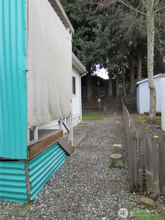 a house view with a backyard space