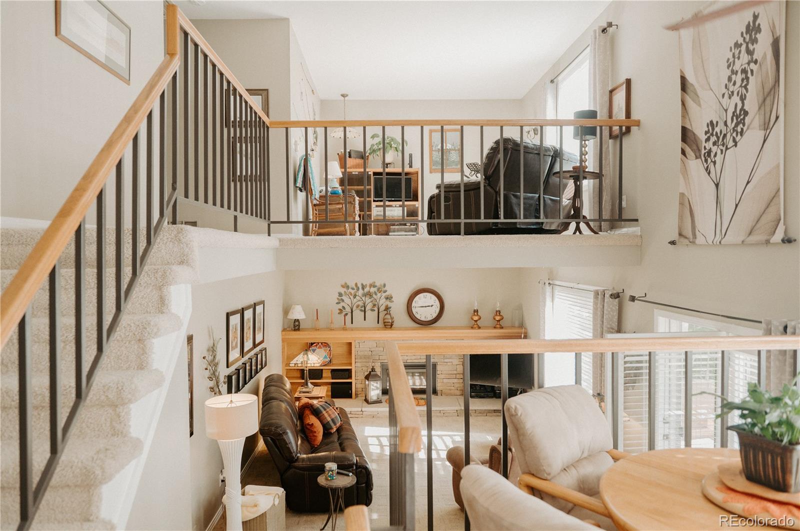 10340 West 100th Place Westminster, CO 80021 - Photo 12 of 25 a view of a livingroom with furniture and staircase