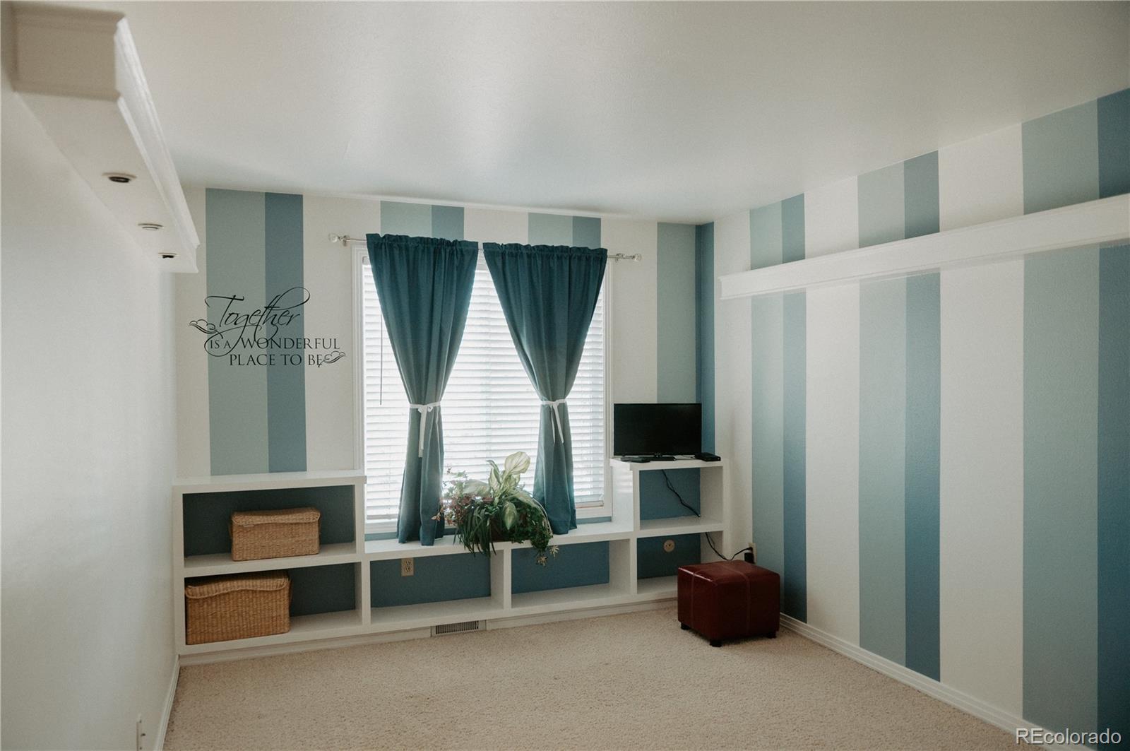 10340 West 100th Place Westminster, CO 80021 - Photo 17 of 25 a view of room with window and cabinet