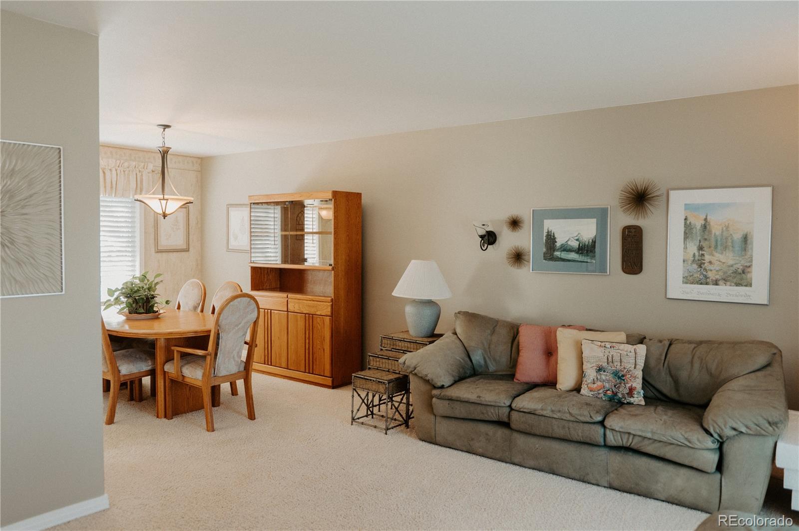10340 West 100th Place Westminster, CO 80021 - Photo 5 of 25 a living room with furniture and wooden floor