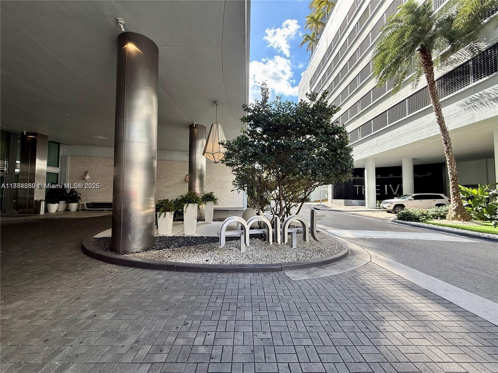 92 Southwest 3rd Street, Unit 1104 Miami, FL 33130 - Photo 13 of 17 a view of a lobby with table and chairs