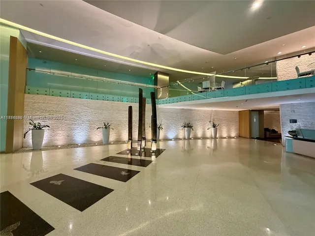 a view of a lake with tall building