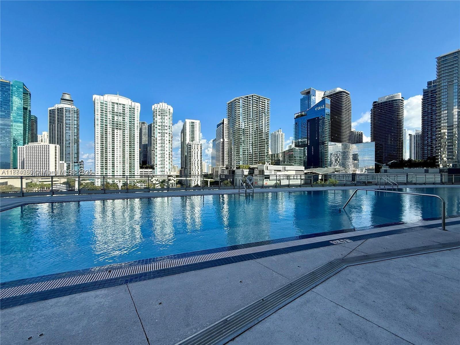 92 Southwest 3rd Street, Unit 1104 Miami, FL 33130 - Photo 15 of 17 a view of a lake with tall building