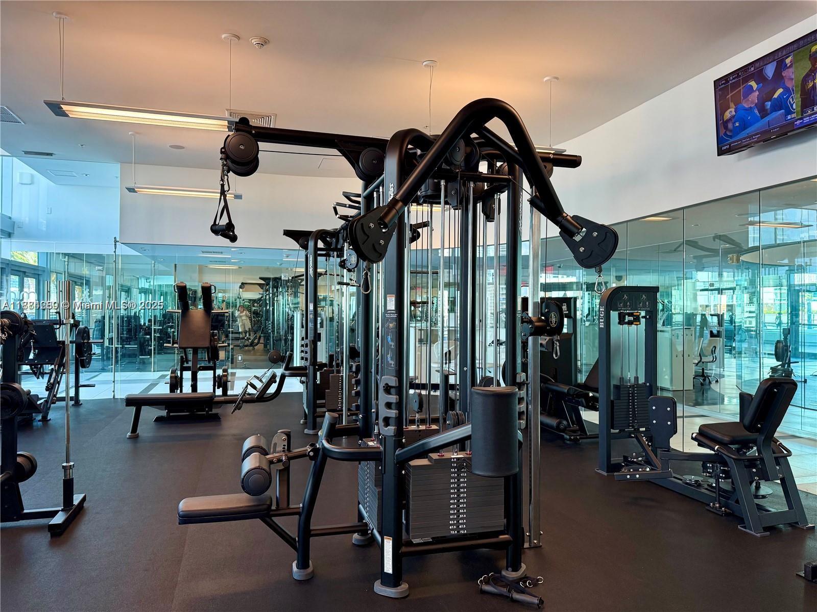 92 Southwest 3rd Street, Unit 1104 Miami, FL 33130 - Photo 16 of 17 a view of a room with gym equipment