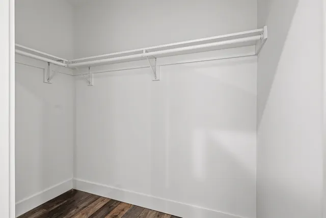 a view of an empty walk in closet