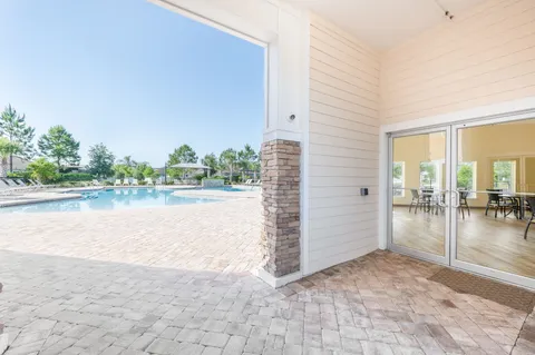 a view of a terrace space with a lake view