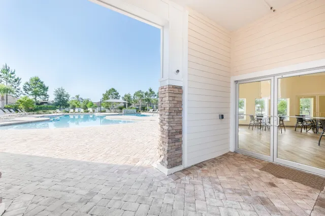a view of a terrace space with a lake view