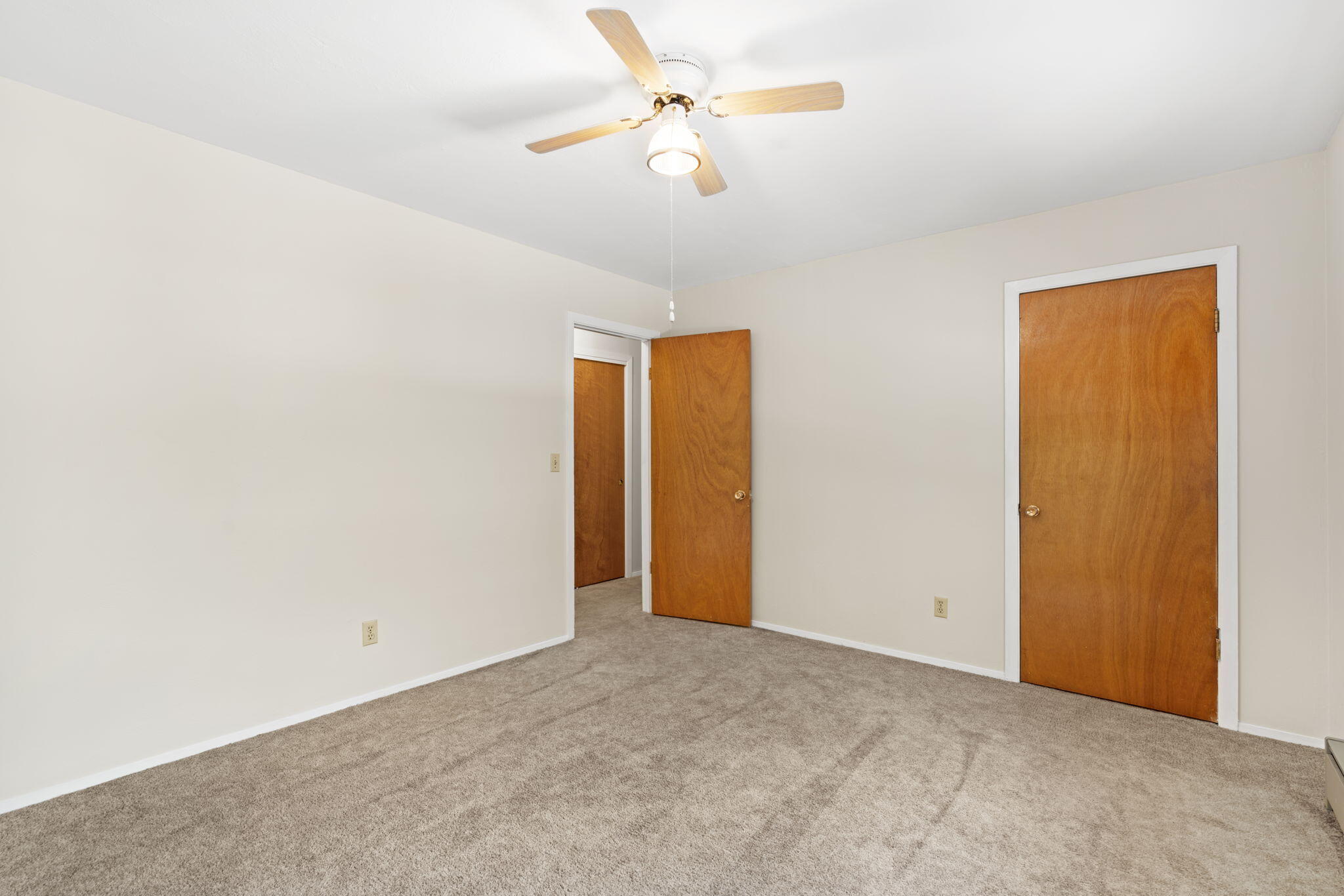 181 Burnt Ranch School Road Burnt Ranch, CA 95527 - Photo 22 of 49 an empty room with closet and a ceiling fan