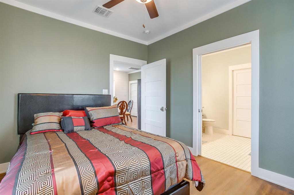 375 J B Vandiver Loop Moody, TX 76557 - Photo 27 of 40 a bedroom with a bed and a painting on the wall