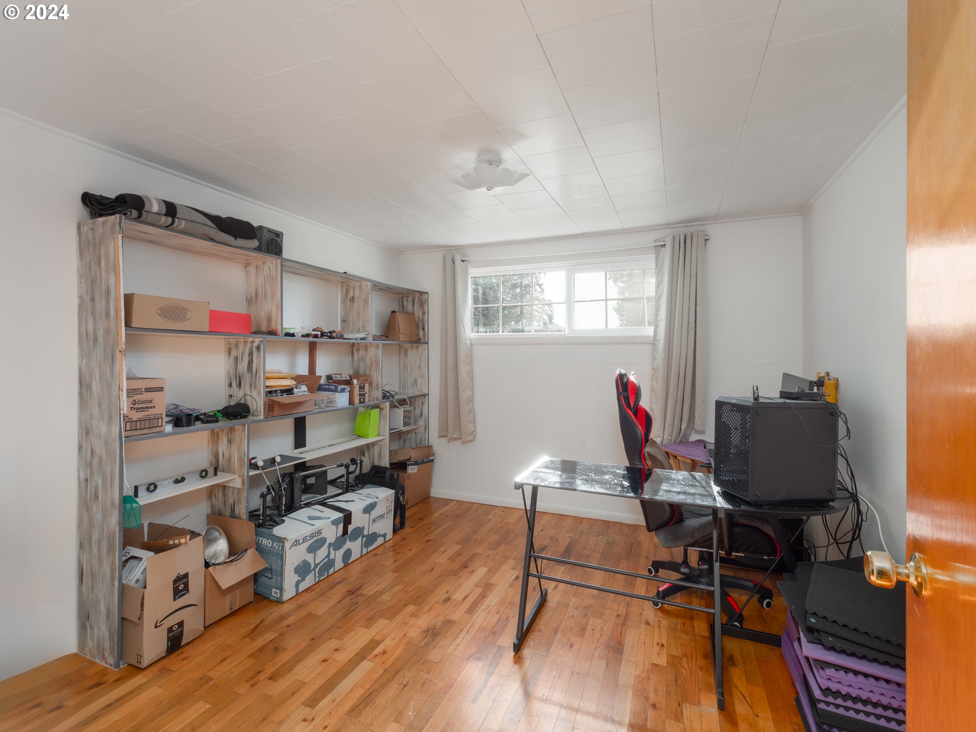 766 Valley View Road Sutherlin, OR 97479 - Photo 15 of 27 a room with furniture and a wooden floor