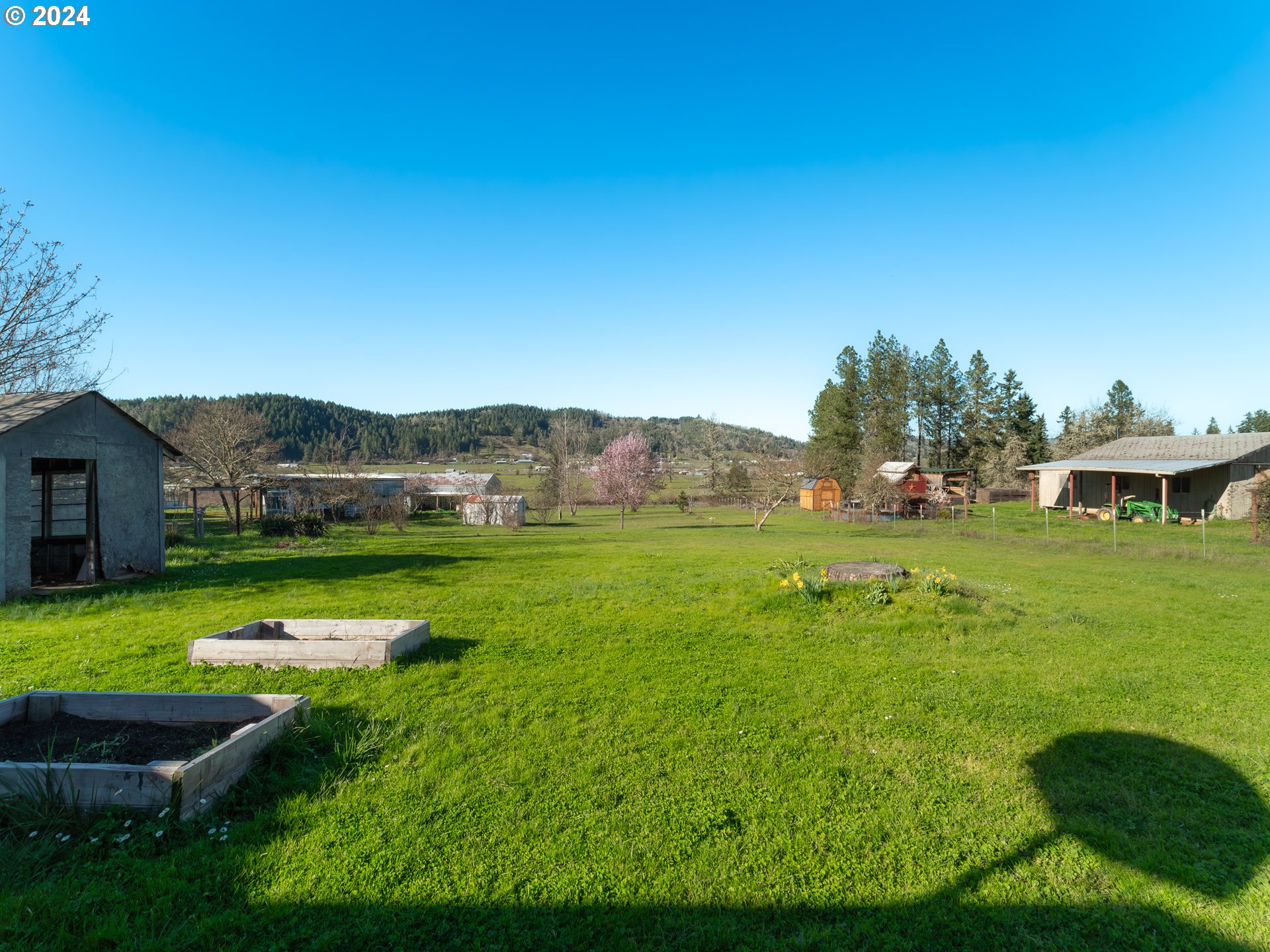 766 Valley View Road Sutherlin, OR 97479 - Photo 23 of 27 a view of a house with a big yard