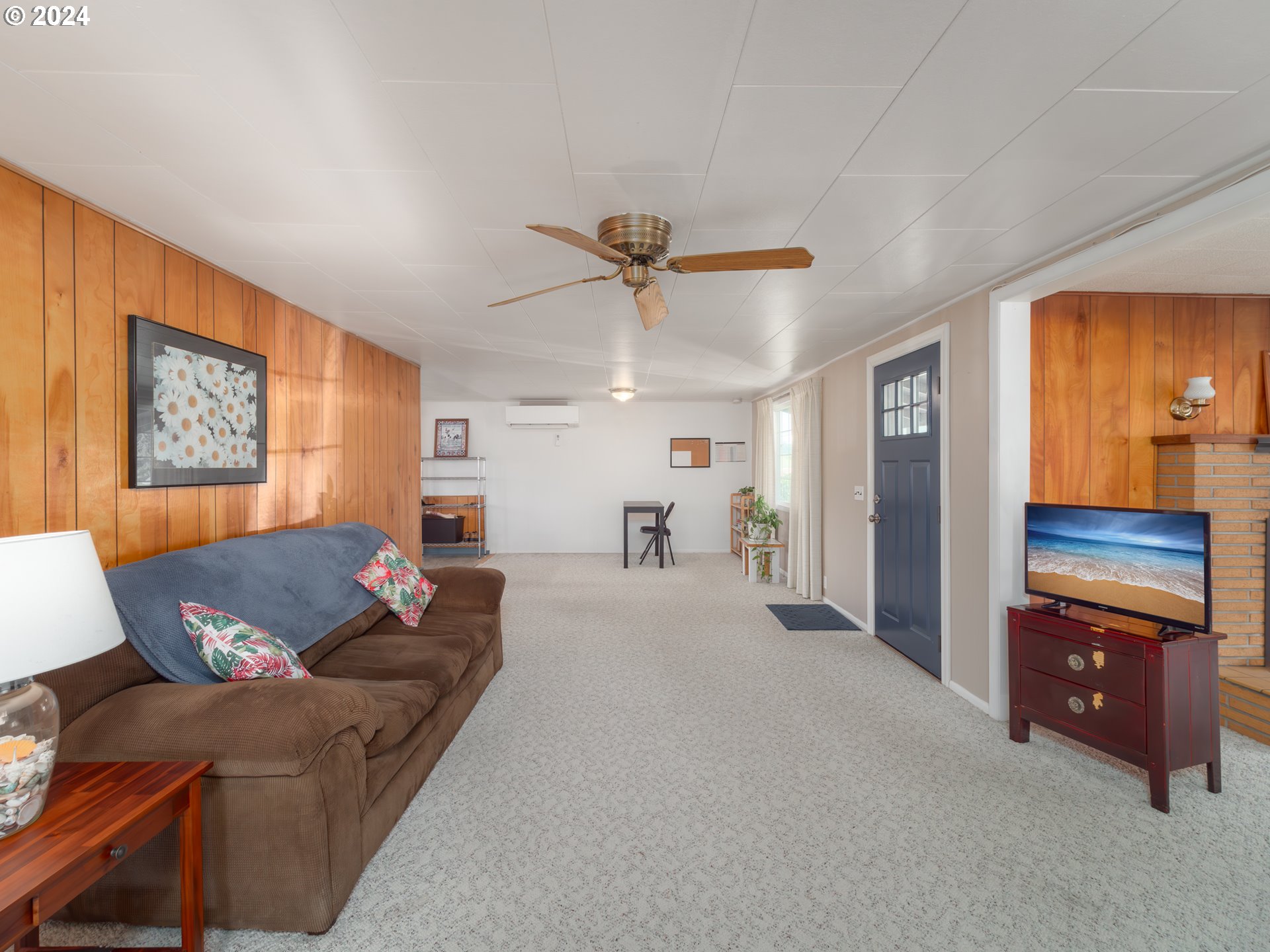 766 Valley View Road Sutherlin, OR 97479 - Photo 3 of 27 a living room with furniture and a ceiling fan