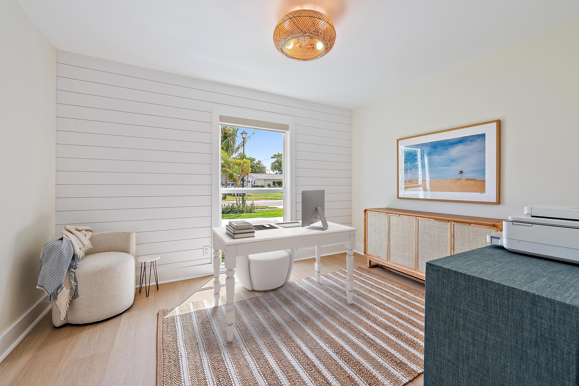 1604 Seabrook Road Tequesta, FL 33469 - Photo 21 of 42 a living room with furniture and a window