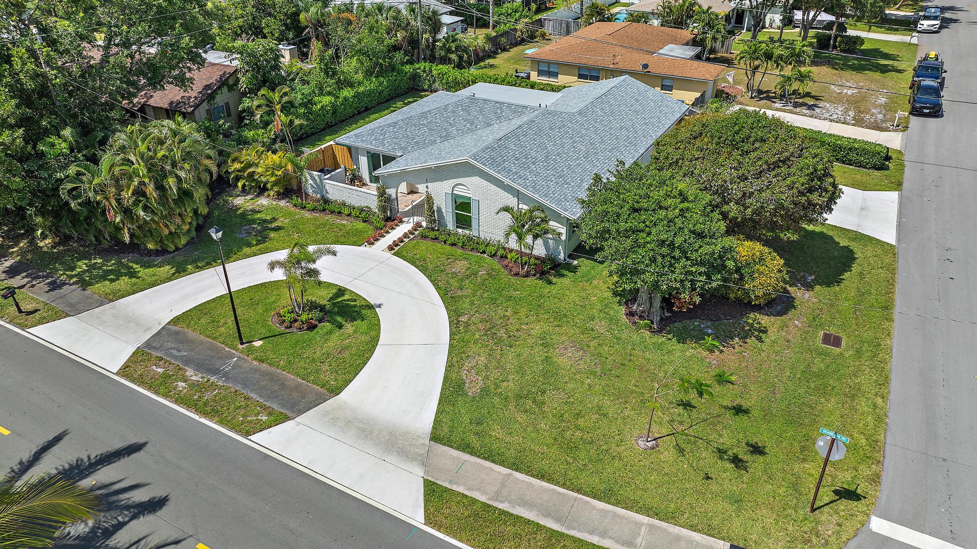 1604 Seabrook Road Tequesta, FL 33469 - Photo 31 of 42 an aerial view of a house