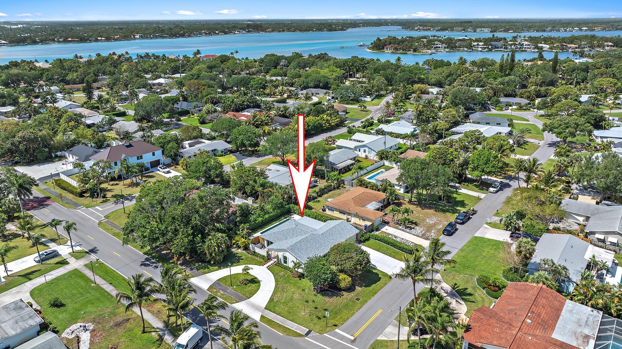 1604 Seabrook Road Tequesta, FL 33469 - Photo 35 of 42 an aerial view of residential building with outdoor space
