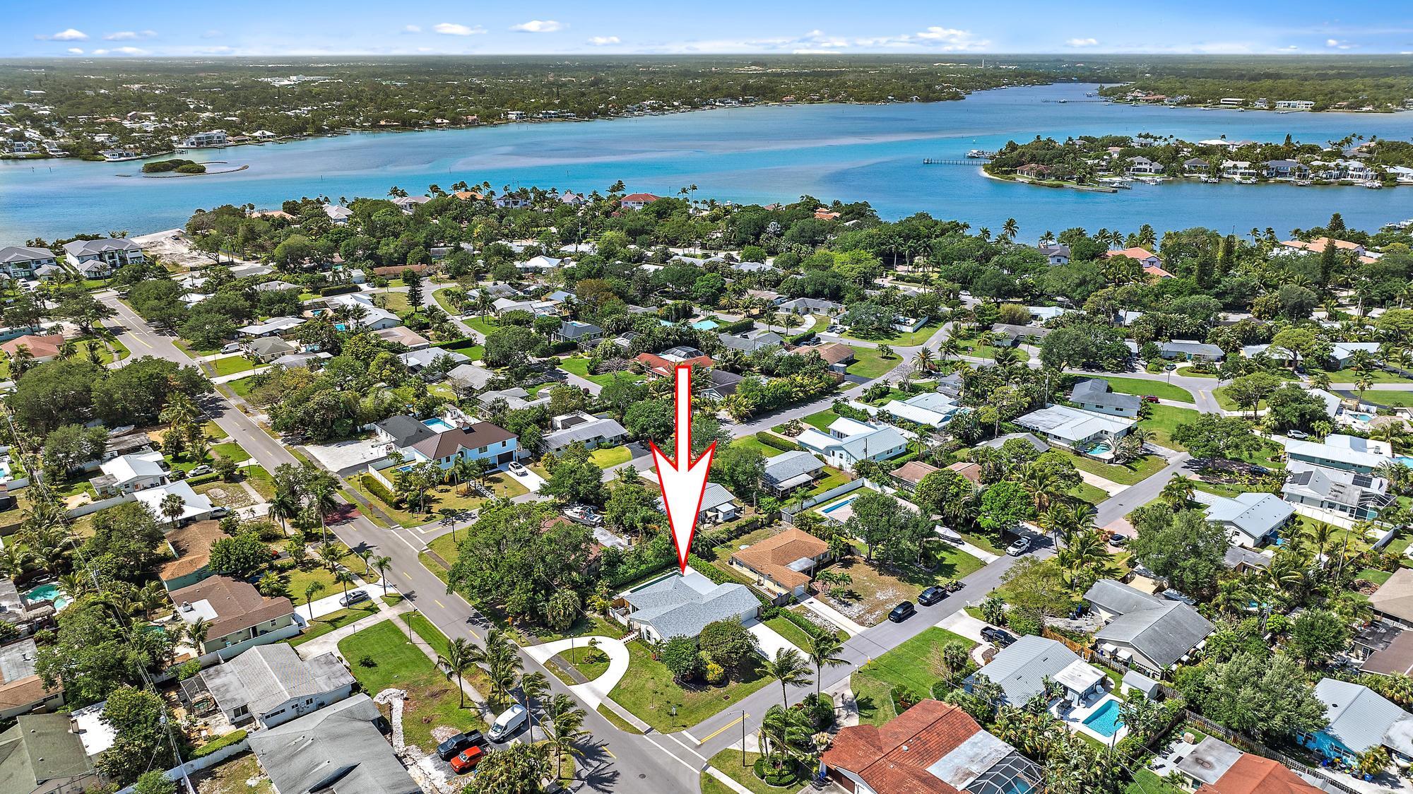 1604 Seabrook Road Tequesta, FL 33469 - Photo 36 of 42 an aerial view of multiple house