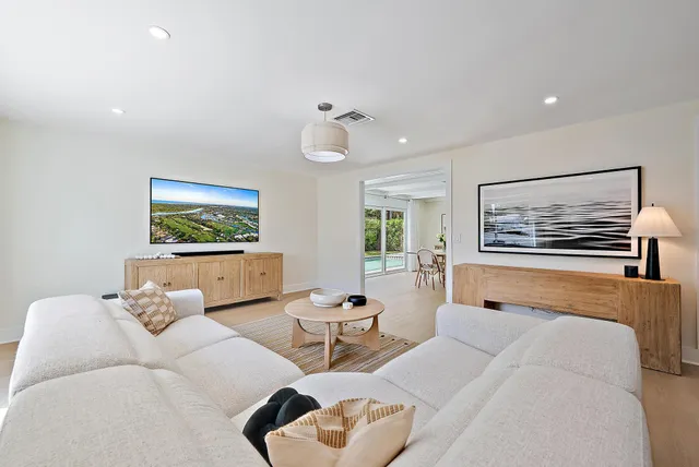 a kitchen with a refrigerator and countertop