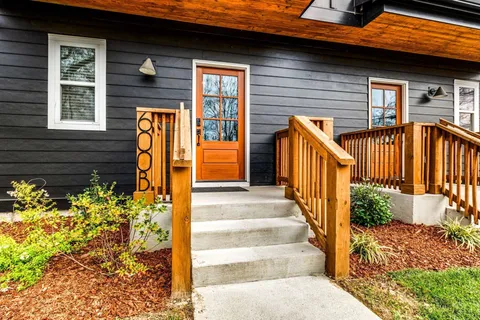 a view of stairs and yard