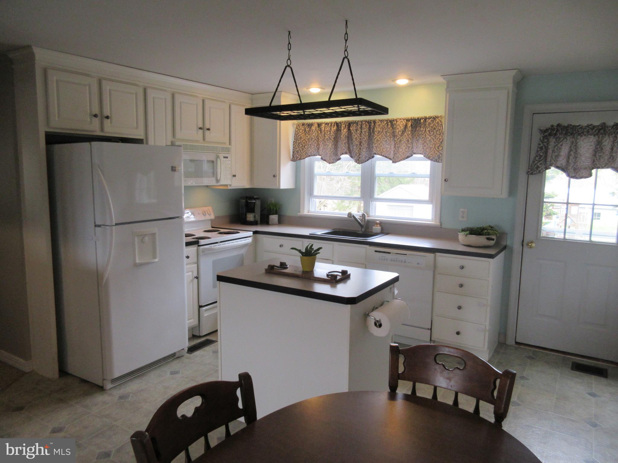 1318-1320 Red Run Road Stevens, PA 17578 - Photo 4 of 11 kitchen island, dishwasher, refrigerator microwave