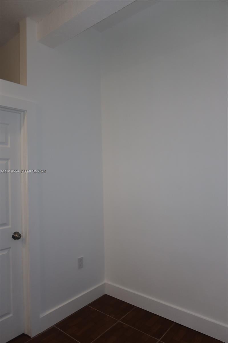 22905 Southwest 114th Place Miami, FL 33170 - Photo 3 of 12 a view of an empty room