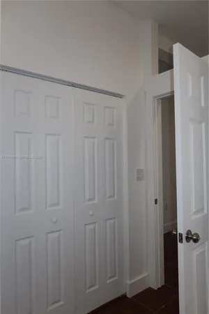 a view of a livingroom with wooden floor