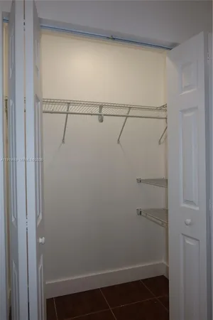 a view of small space with racks on the wall