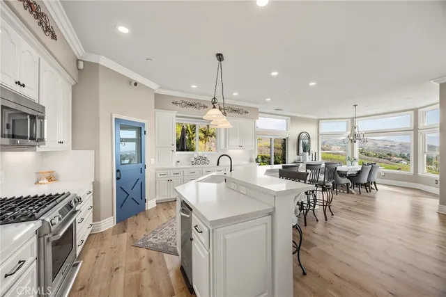 a dining room with furniture window wooden floor