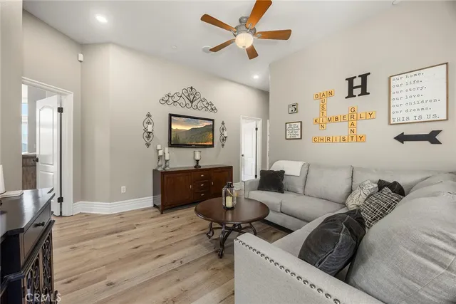 a bathroom with a glass shower door and a sink