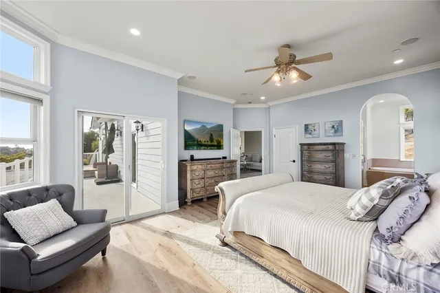 a view of patio with a table and chairs under an umbrella