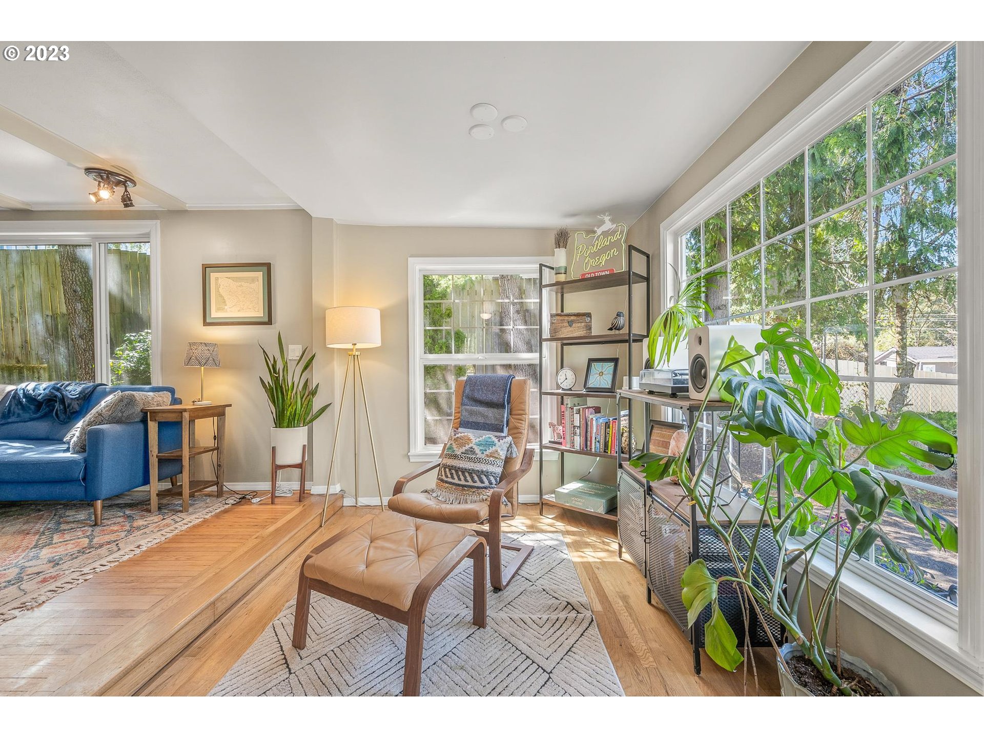 4052 Southwest Huber Street Portland, OR 97219 - Photo 24 of 48 a living room with furniture and a potted plant