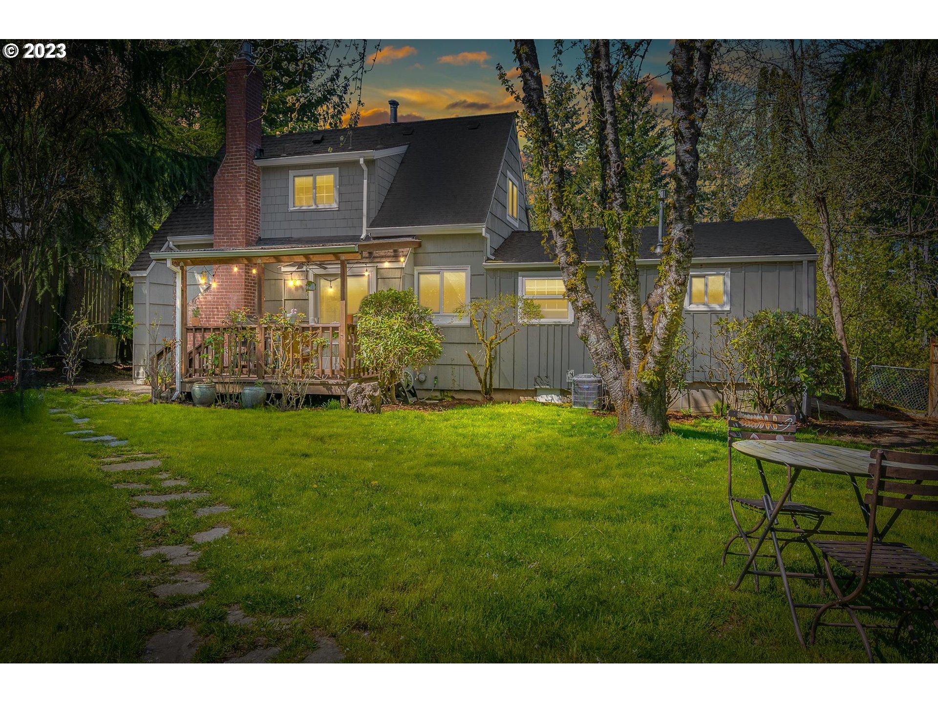 4052 Southwest Huber Street Portland, OR 97219 - Photo 3 of 48 a view of a back yard of the house