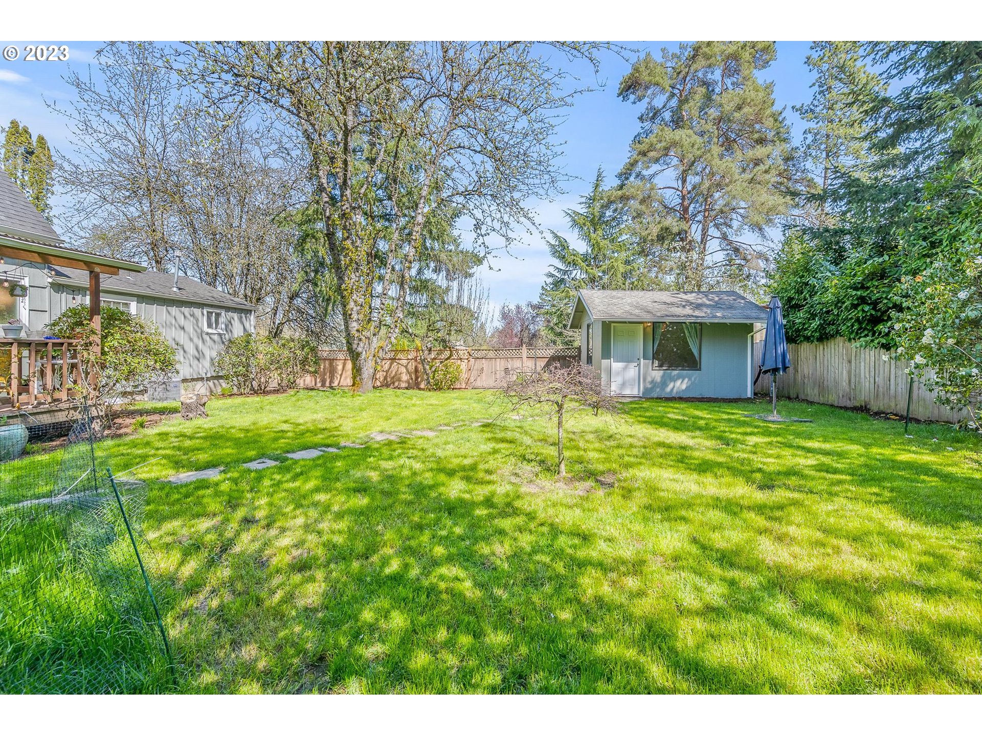 4052 Southwest Huber Street Portland, OR 97219 - Photo 34 of 48 a house view with a garden space