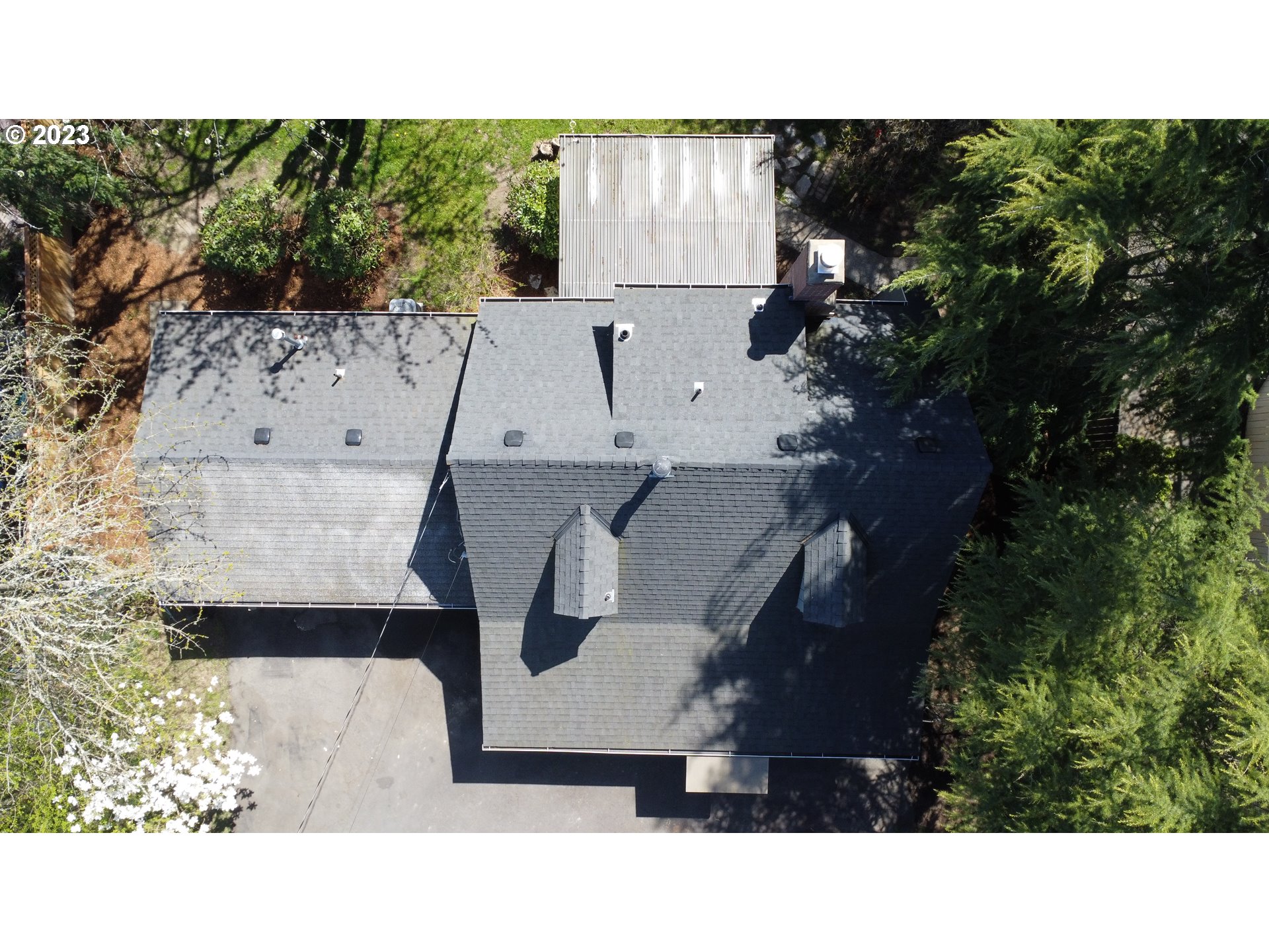 4052 Southwest Huber Street Portland, OR 97219 - Photo 40 of 48 a black and white photo of a house