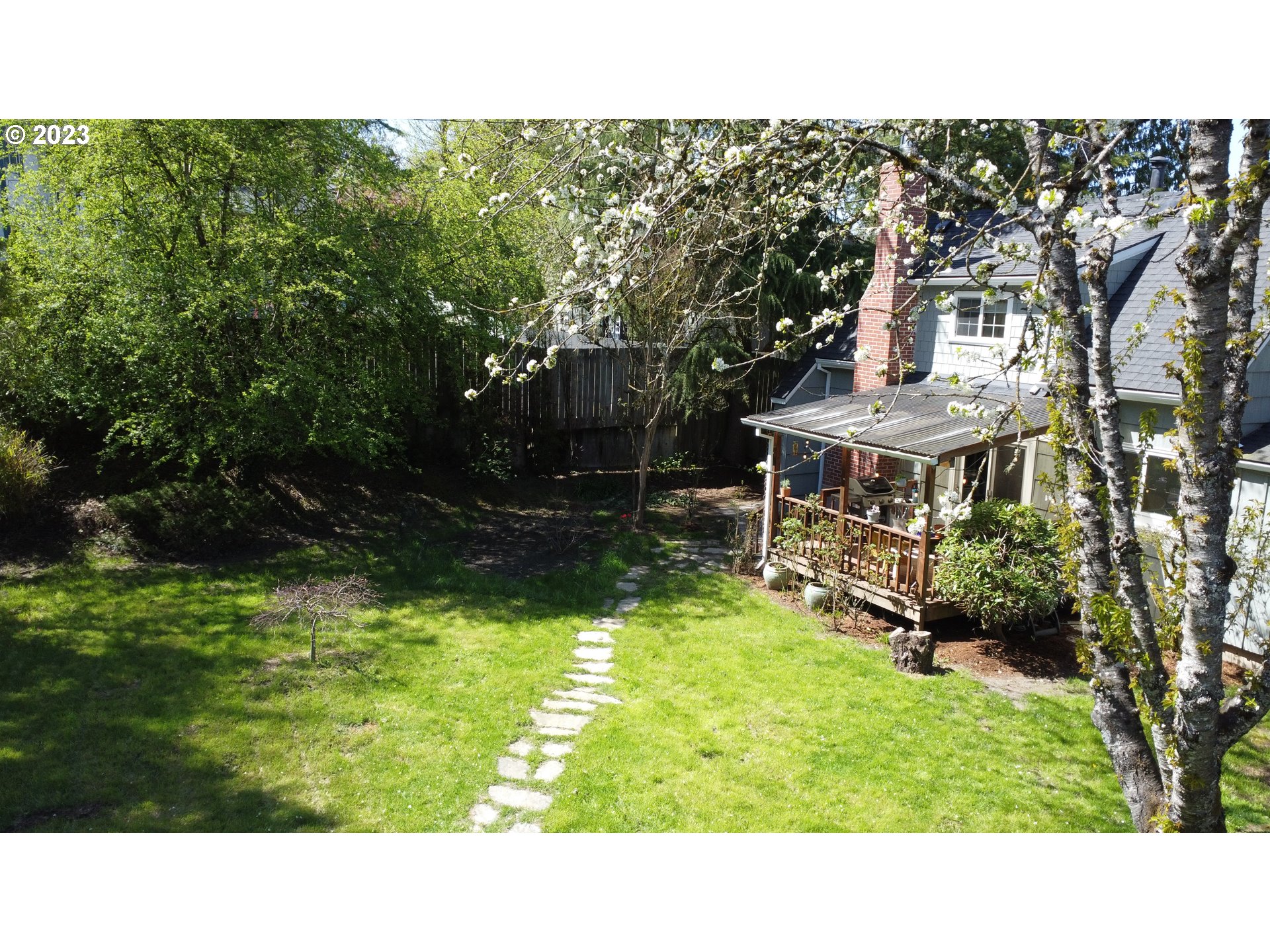 4052 Southwest Huber Street Portland, OR 97219 - Photo 43 of 48 a black and white photo of a house